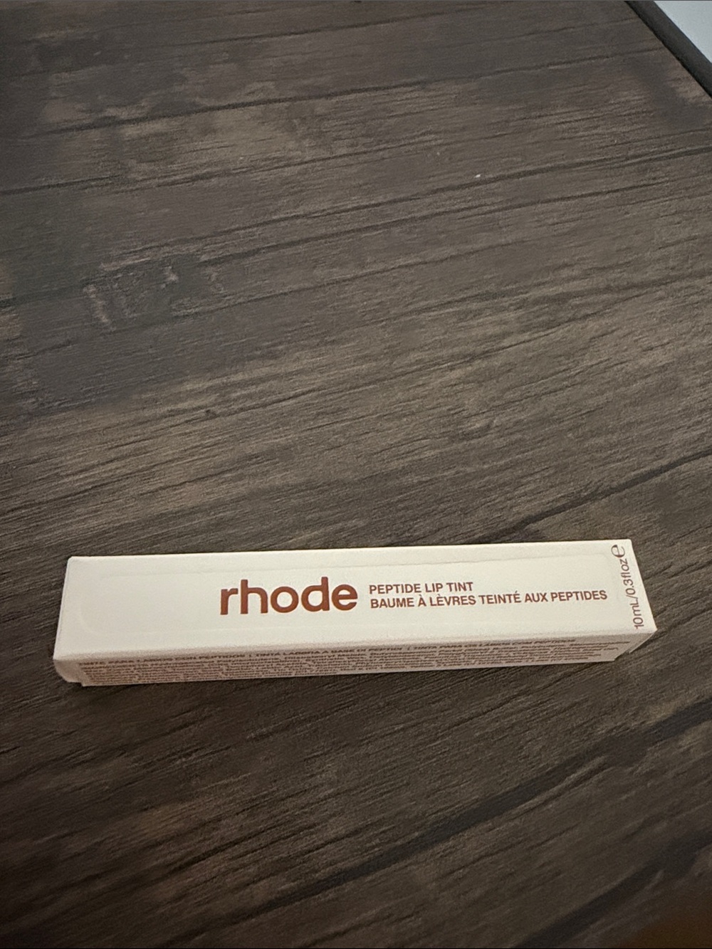RHODE Peptide Lip Treatment in Cinnamon Roll